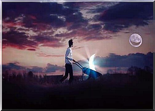 Man carrying the moon in wheelbarrow