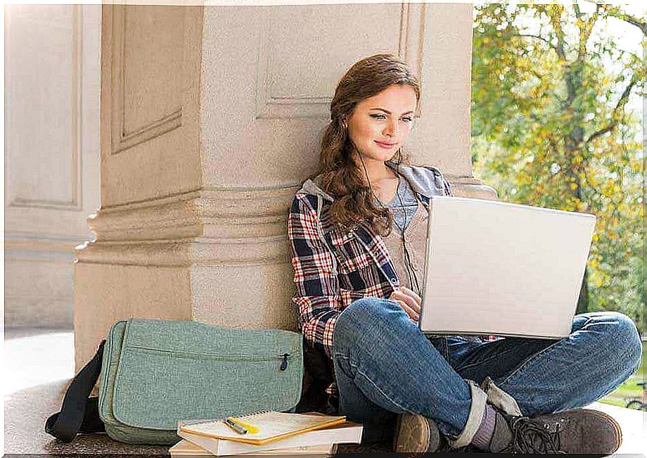 young man studying on the computer