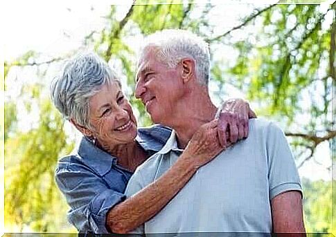 elderly couple smiling