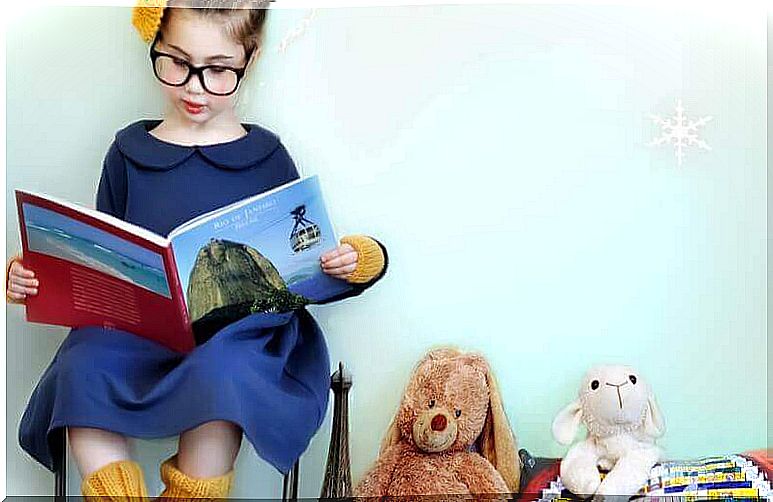 smart child reading a book