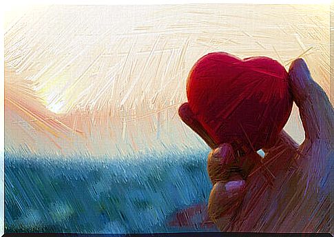 Painting with hand holding heart