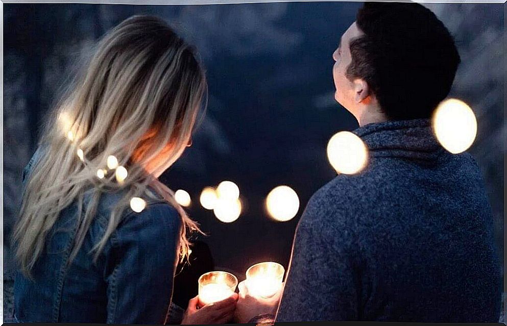 couple under the light of lamps