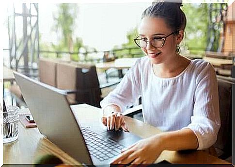 Woman using computer at work.