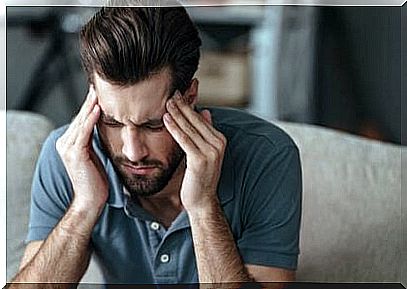 man feeling headache